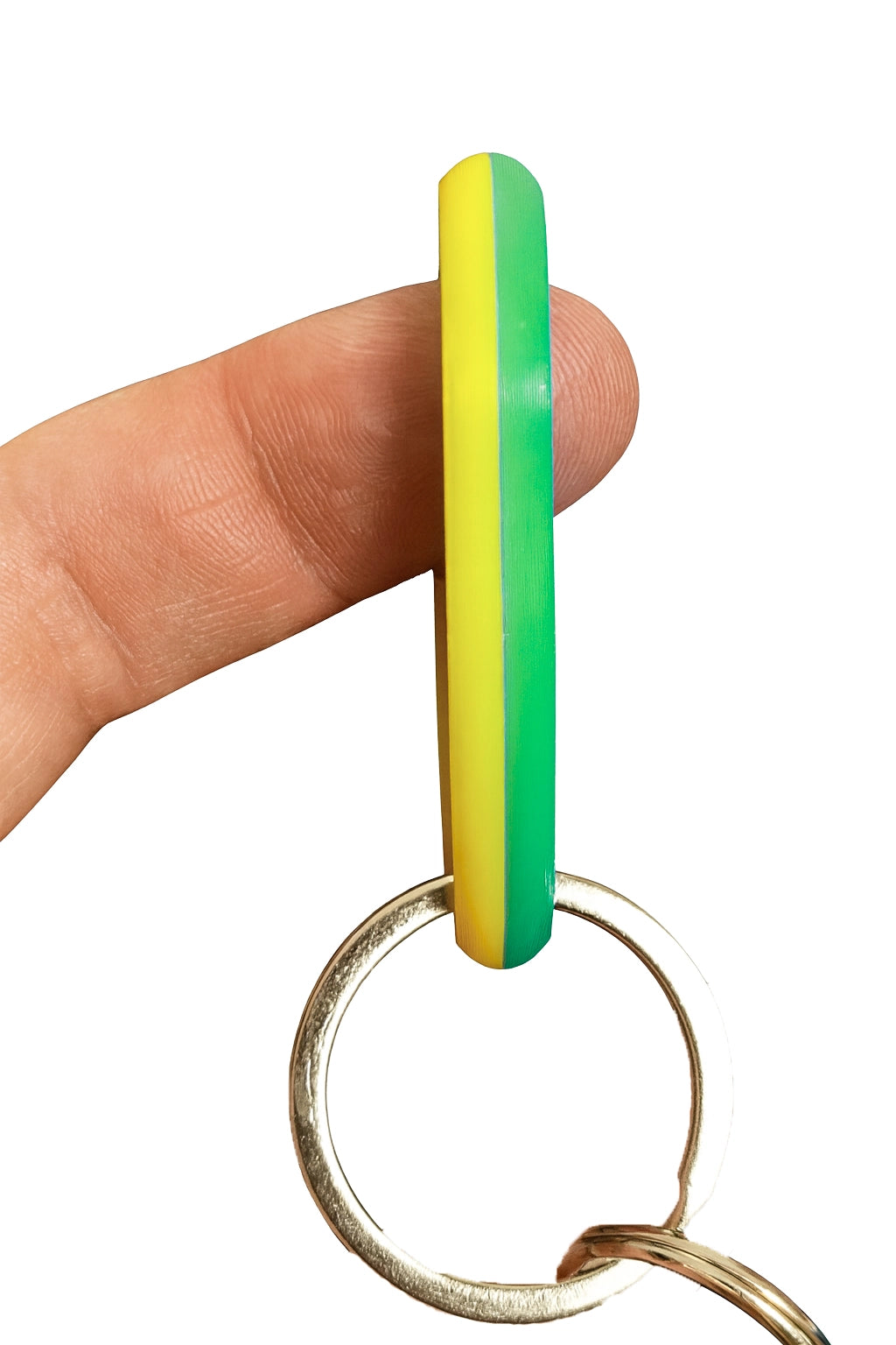 SpinnDuo Citrus Shift spinner balanced on a fingertip, showing smooth rotation and relaxed control
